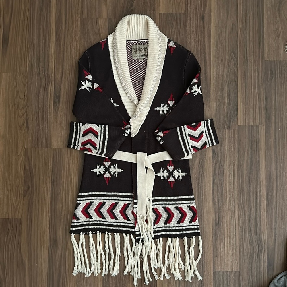 Powder River Outfitters mid length front tie cardigan with tassels.
